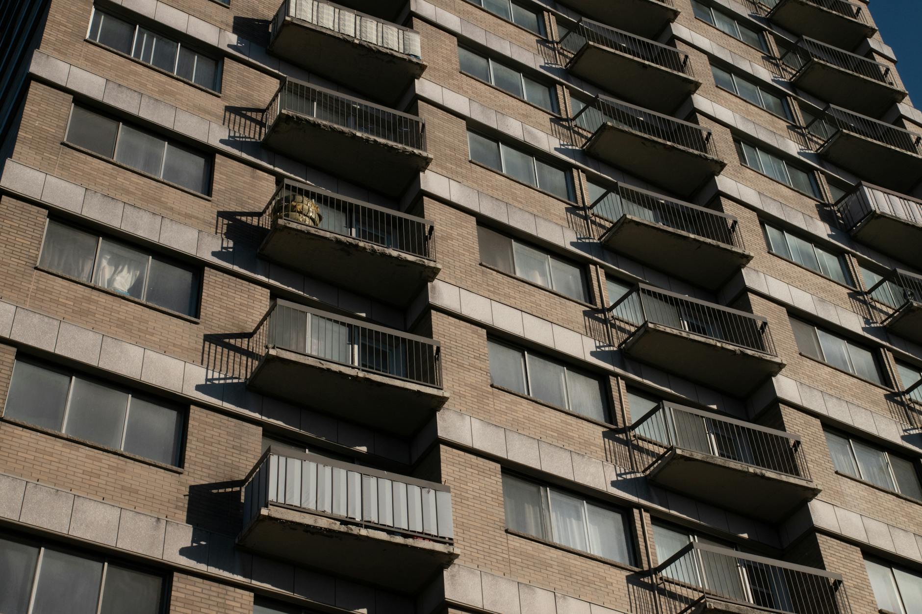 High-rise residential building with multiple balconies