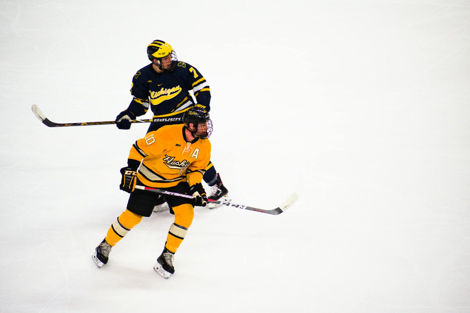 Ice hockey players competing during a fast-paced game