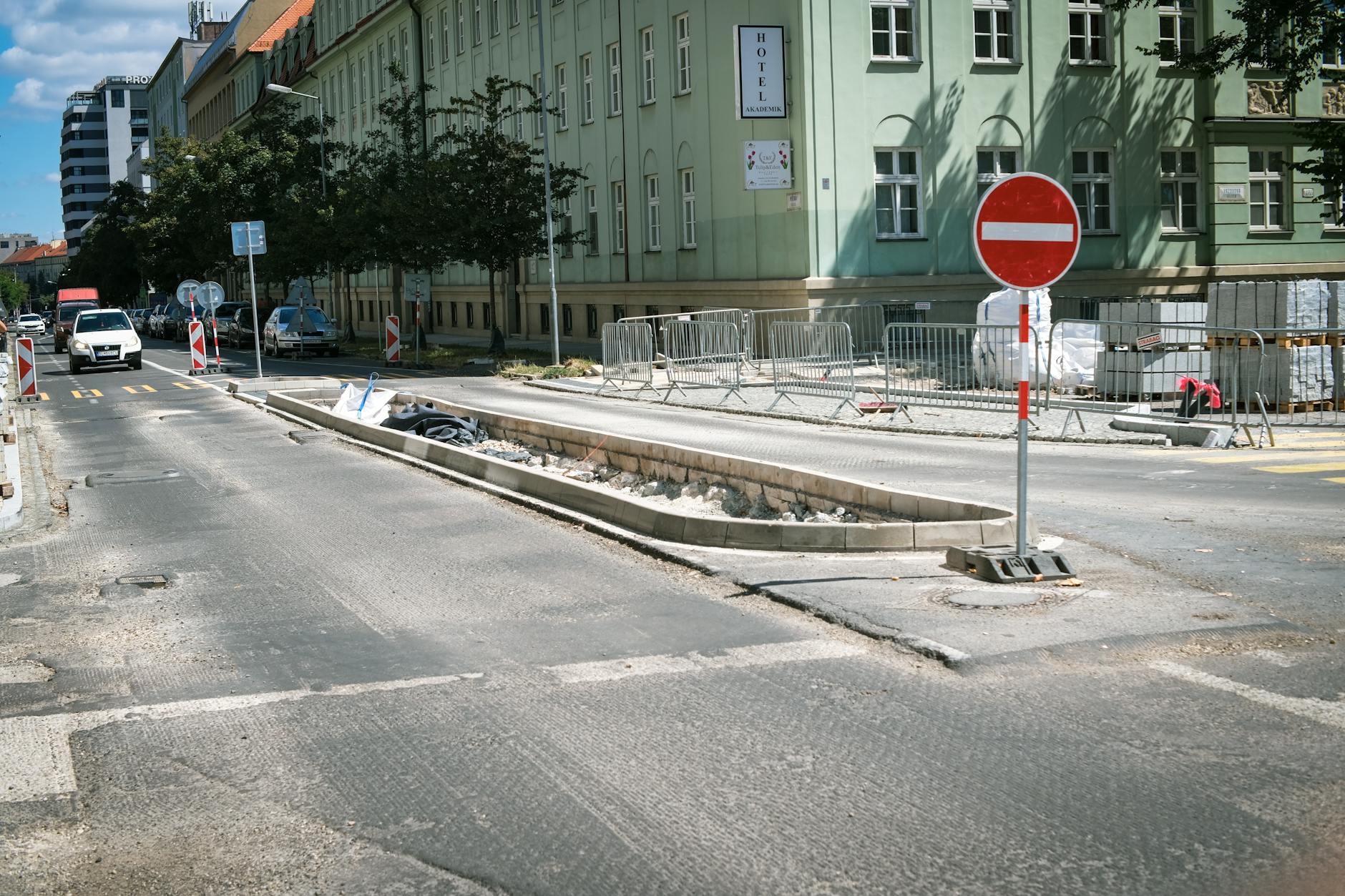 Road construction scene with traffic signs and barriers